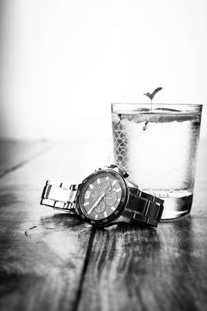 Alloa, Scotland - 17 July 2019 - classic watch isolated on a black and white background. Accurist man watchのeditorial素材