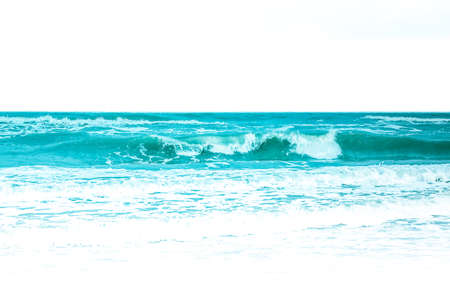 Ocean waves crashing  on the shore