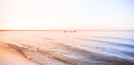 Ocean sunset sky - gorgeous panorama twilight sky and peaceful water background