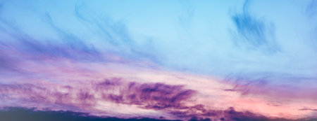 Colourful and creative clouds composition on sunset sky