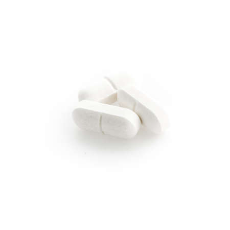 Vitamin herbal medicine pills/ tablets / capsules isolated on white background with shadows