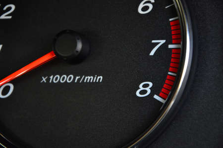 Close-up dashboard with speedometer and RPMの写真素材