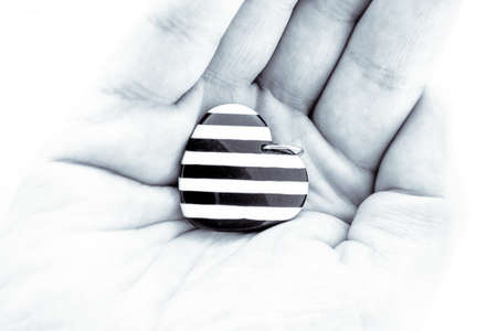 A hand holding heart - health care, love, donate and family insurance concept,world heart day, world...