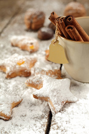 christmas cookies with icing sugar dustingの写真素材