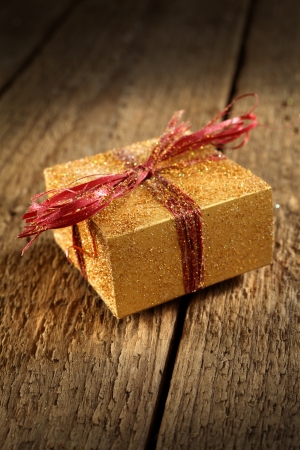 wrapped present on rustic backgroundの写真素材