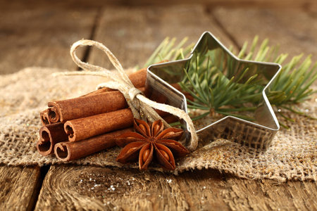 cinnamon with anise and star shaper on linen clothの写真素材