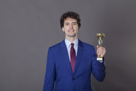 Good looking boy takes awardの写真素材