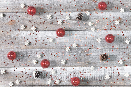 Pattern made of christmas silver and red decorations. Top view, flat lay of stars ang glitterの写真素材