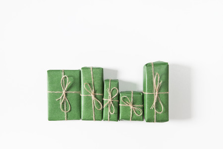 Presents in gift boxes on whit background. Flat lay, top viewの写真素材