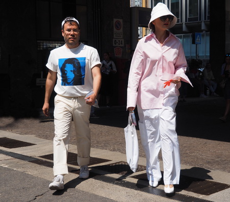MILAN, ITALY -JUNE 16, 2018: A Fashionable couple walking in the street before the MARNI fashion show, during Milan Fashion Week Men and women spring collectionsのeditorial素材
