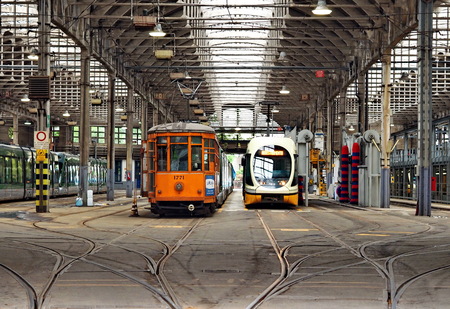 MILAN, ITALY - AUGUST 26, 2018: Trams parked in ATM depot TICINESE in GIOVENALE street, Milan, Lombardy, Italy.のeditorial素材