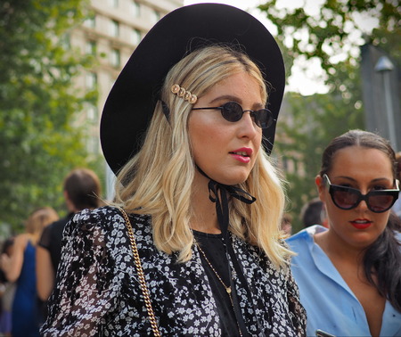 MILAN, Italy: 19 september 2018: Fashionable woman street style outfit before Alberta Ferretti...