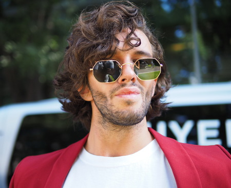 MILAN, Italy: 23 September 2018: Eccentric man in the street before Armani Fashion show 2018 during Milan Fashion week fall winter 2018/2019.のeditorial素材