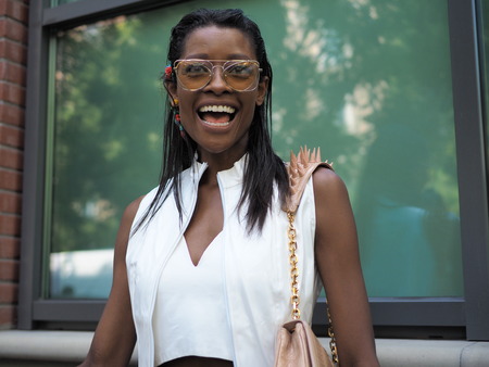 MILAN, Italy: September, 20 2018: Model street style outfit before FENDI fashion show during Milan fashion week fall / winter 2018/2019.のeditorial素材