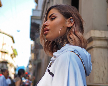 MILAN, Italy: September 21, 2018: Fashion blogger Zoe Cristofoli posing in street style outfit before ICEBERG fashion show during MFW fall / winterのeditorial素材