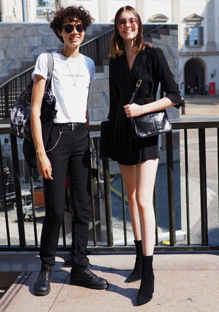 MILAN, Italy, 20 septembre 2018: Fashionable women posing for photographers on Arengario stairs after Calcaterra fashion show during Milan fashion week fall winter 2019.のeditorial素材