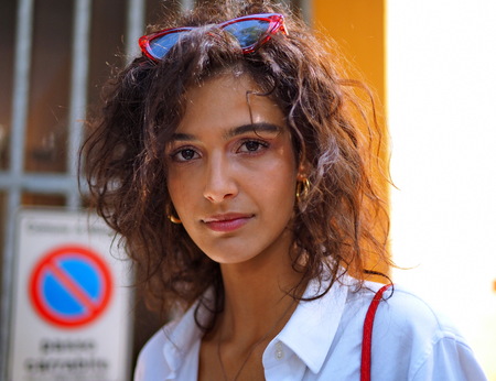 MILAN, Italy: 23 September 2018: Model in street style outfit before Armani Fashion show 2018 during Milan Fashion week fall winter 2018/2019.のeditorial素材