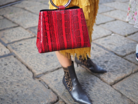 MILAN, Italy: 19 september 2018: Fashionable woman in the street style outfit before ANNAKIKI fashion show during Milan fashion week Fall winter 2018/2019.のeditorial素材