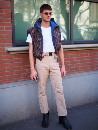 MILAN, Italy: 14 January 2019: Fashion bloggers street style outfit before and after FENDI fashion show during Milan Fashion Week man Fall / winter 2019/2020のeditorial素材