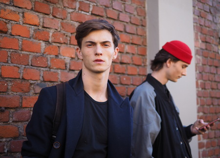 MILAN, Italy: 14 January 2019: Model street style outfit after FENDI fashion show during Milan Fashion Week man Fall / winter 2019/2020のeditorial素材