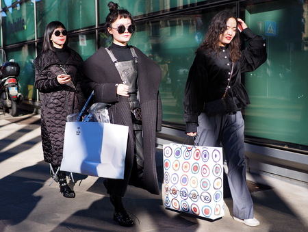 MILAN, Italy: 14 January 2019: Fashion bloggers street style outfits before ARMANI fashion show during Milan Fashion Week man Fall / winter 2019/2020のeditorial素材