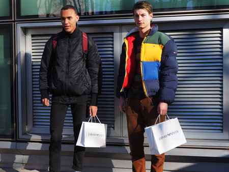 MILAN, Italy: 14 January 2019: Fashion bloggers street style outfits before ARMANI fashion show...