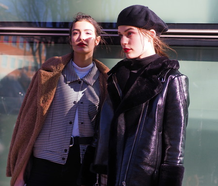 MILAN, Italy: 14 January 2019: Fashion bloggers street style outfits before and after ARMANI fashion show during Milan Fashion Week man Fall / winter 2019/2020のeditorial素材