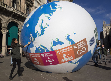 MILAN, Italy: 15 March 2019: Fridays for future, student strikes in the Duomo square with a big globe for climate actions.のeditorial素材