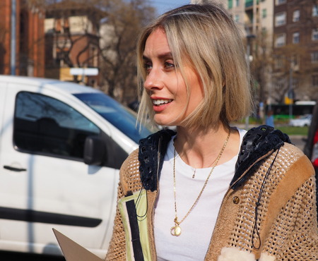 MILAN, Italy: February 21, 2019: Lisa Hahnbuck street style outfit before Fendi fashion show during Milan fashion week Fall / winter 2019/2020のeditorial素材