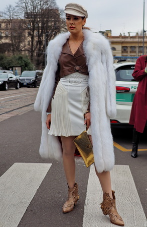 MILAN, Italy: February 23, 2019: Fashion bloggers street style outfits before Roberto Cavalli fashion show during Milan fashion week Fall / winter 2019/2020