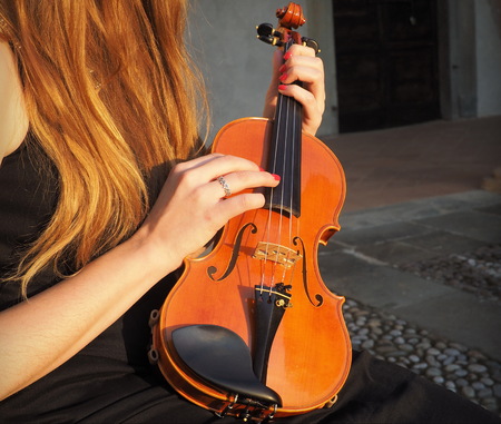 Pizzicato technique on violinの写真素材