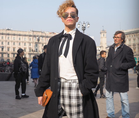 MILAN, Italy: February 20, 2019: Fashion blogger street style outfit after Alberto Zambelli fashion show during Milan fashion week Fall / winter 2019/2020のeditorial素材