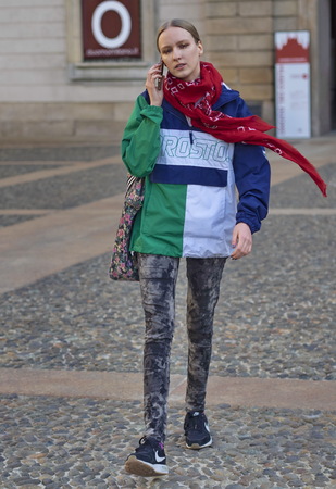MILAN, Italy: February 24, 2019: Model posing in street style outfit after Stella Jean fashion show during Milan fashion week Fall / winter 2019/2020のeditorial素材