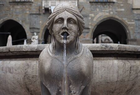 A stute of the Contarini fountain in the middle of "Old Square" historic square in Bergamo, Lombardy, Italy.の写真素材