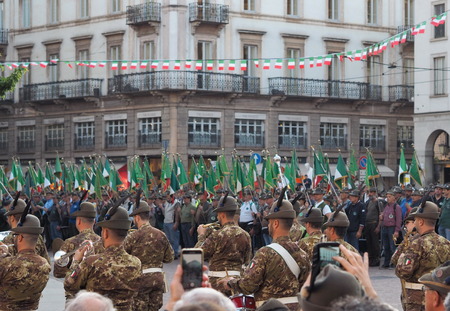 MILAN, ITALY, May 11, 2019: Alpini celebrating the national gathering in the "Piazza della Scala" square.のeditorial素材