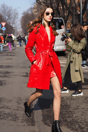 MILAN, Italy: February 21, 2019: Model street style outfit before Armani fashion show during Milan fashion week Fall / winter 2019/2020のeditorial素材