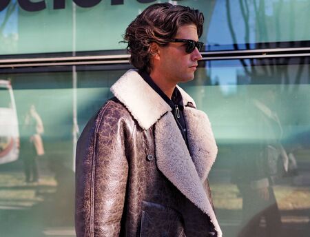 MILAN, Italy: 14 January 2019: Fashion blogger street style outfit before ARMANI fashion show during Milan Fashion Week man Fall / winter 2019/2020のeditorial素材