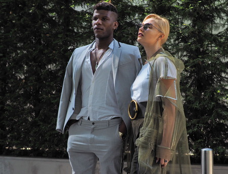 MILAN, Italy: 23 September 2018: Fashion couple in street style outfit before Armani Fashion show 2018 during Milan Fashion week fall winter 2018/2019.のeditorial素材