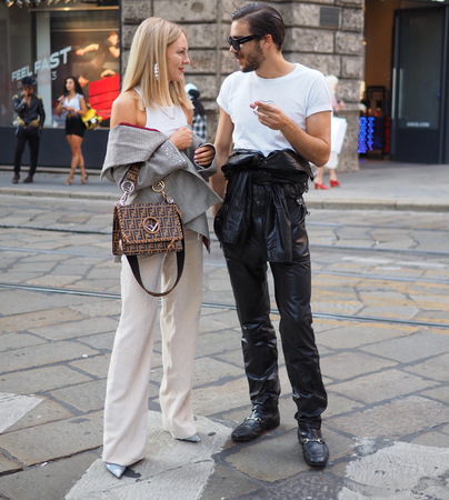MILANO, Italy: September 21, 2018: Fashion bloggers posing in street style outfits before ICEBERG fashion show during MFW fall / winter 2018/2019.のeditorial素材