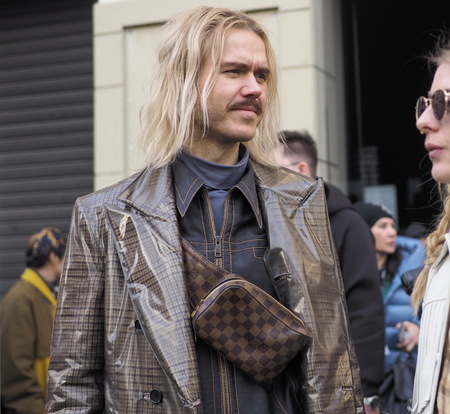 MILAN, Italy: 13 January 2019: Street style outfits after JOHN RICHMOND fashion show, during Milan fashion week Man fall / winter 2019/2020のeditorial素材