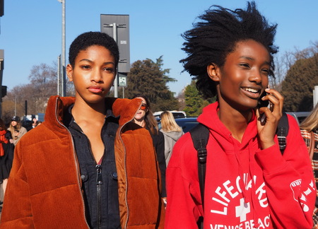 MILAN, Italy: February 22, 2019: Models style street outfits after TOD'S fashion show during Milan fashion week Fall / winter 2019/2020のeditorial素材