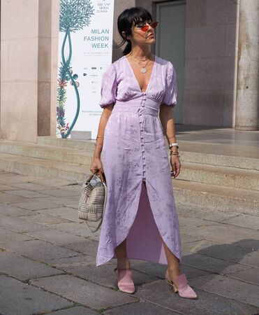 MILAN, Italy: September 22, 2018: Fashion blogger street style outfit before Philosophy by Lorenzo Serafini fashion show during Milan fashion week fall / winter 2018/2019.のeditorial素材