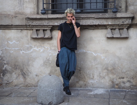 MILAN, Italy: 19 September 2019: Eccentric man street style outfits before Bottega Veneta fashion show during Milan fashion week Spring / Summer 2019/2020のeditorial素材