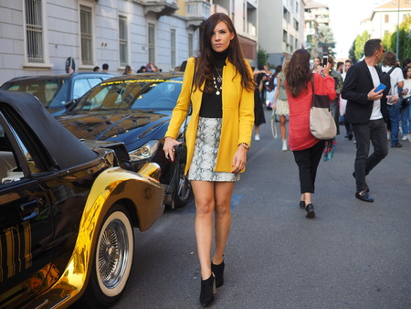 MILANO, Italy: September 20, 2019: Fashion bloggers posing in outfit style before ICEBERG fashion show during MFW spring / summer 2019/2020のeditorial素材