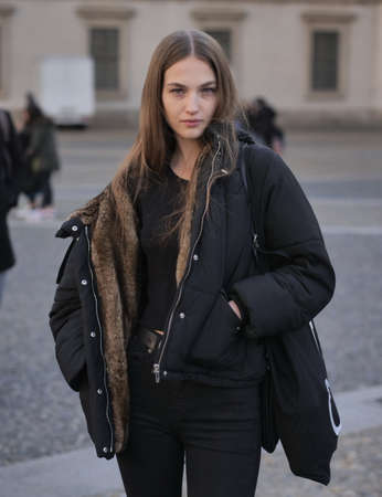 MILAN, Italy: 20 February 2020: Model street style outfit after Vivetta fashion show during Milan...