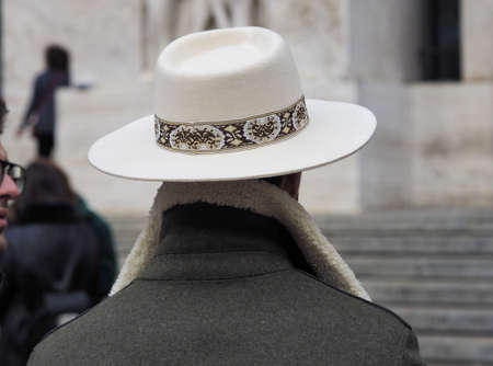 MILAN, Italy: 14 January 2019: Fashion blogger street style outfit during Milano Fashion Week man...