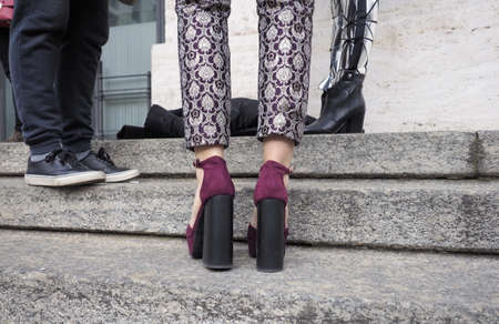 MILAN, Italy: 20 February 2019: Fashion bloggers street style outfits during Milan fashion week Fall...