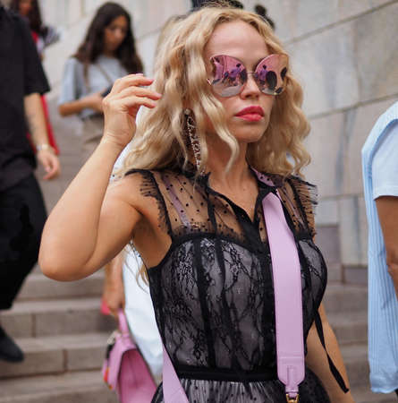 MILAN, Italy: September 21, 2018: Fashion bloggers and models in Duomo square after ACT 1 fashion...