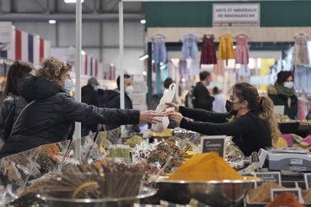 Rho, Italy, 8 December 2021: Artisans fairs with internationals food and no food, dancers, singers and typical products from the worldのeditorial素材