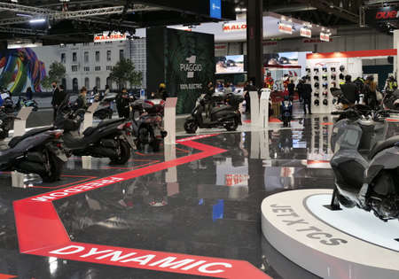 Girls, Motorbikes and accessories exposed at EICMA, international motorcycle exhibition, Lombardy, Italy.のeditorial素材